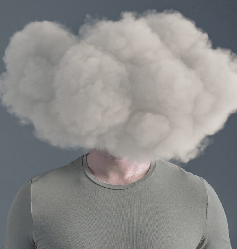 Fantastical photo of a cloud hanging over a man's head