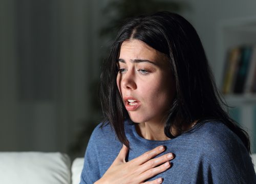 Woman suffering from anxiety and a panic attack