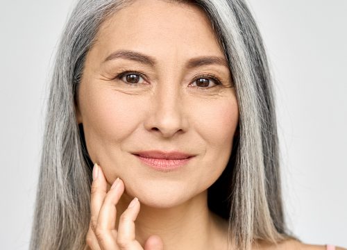 Older woman with crepey skin around her eyes