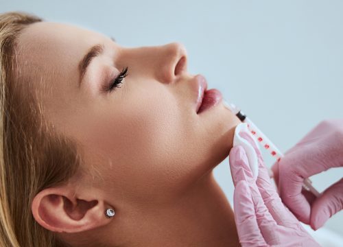 Photo of a woman receiving dermal filler treatments