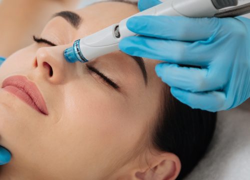 Woman receiving a HydraFacial® treatment