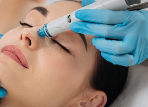 Woman receiving a HydraFacial® treatment