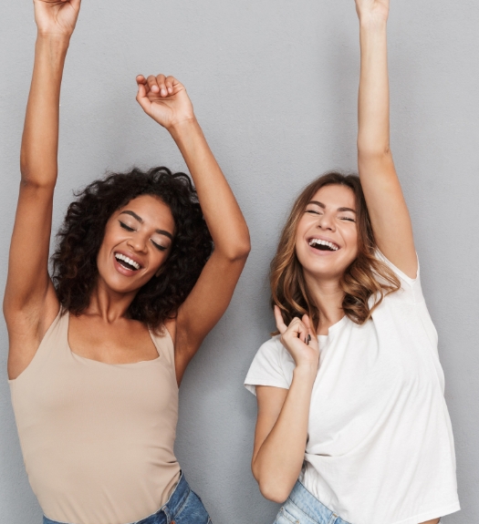 Two women celebrating