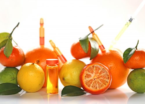 Photo of oranges, lemons, and limes with IV shots in them