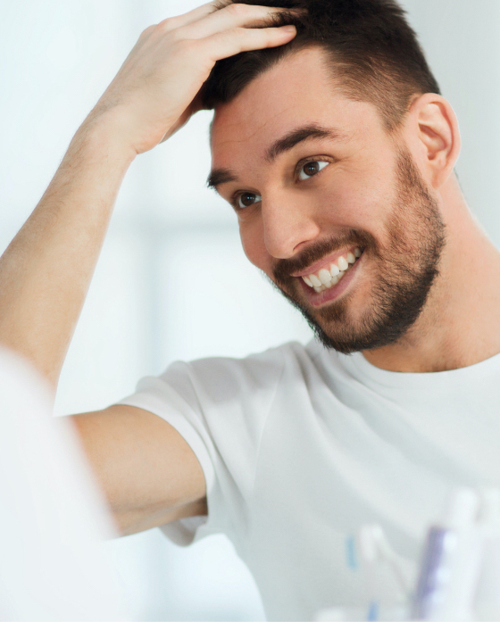 Photo of a happy man with a full head of hair