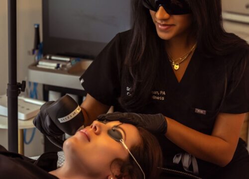 Photo of Srisha performing the Tribella™ treatment on a patient